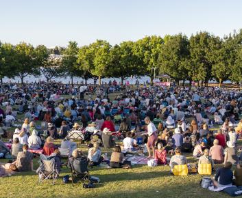 Crowd of people enjoying a Lakespeare show at Lake Burley Griffin